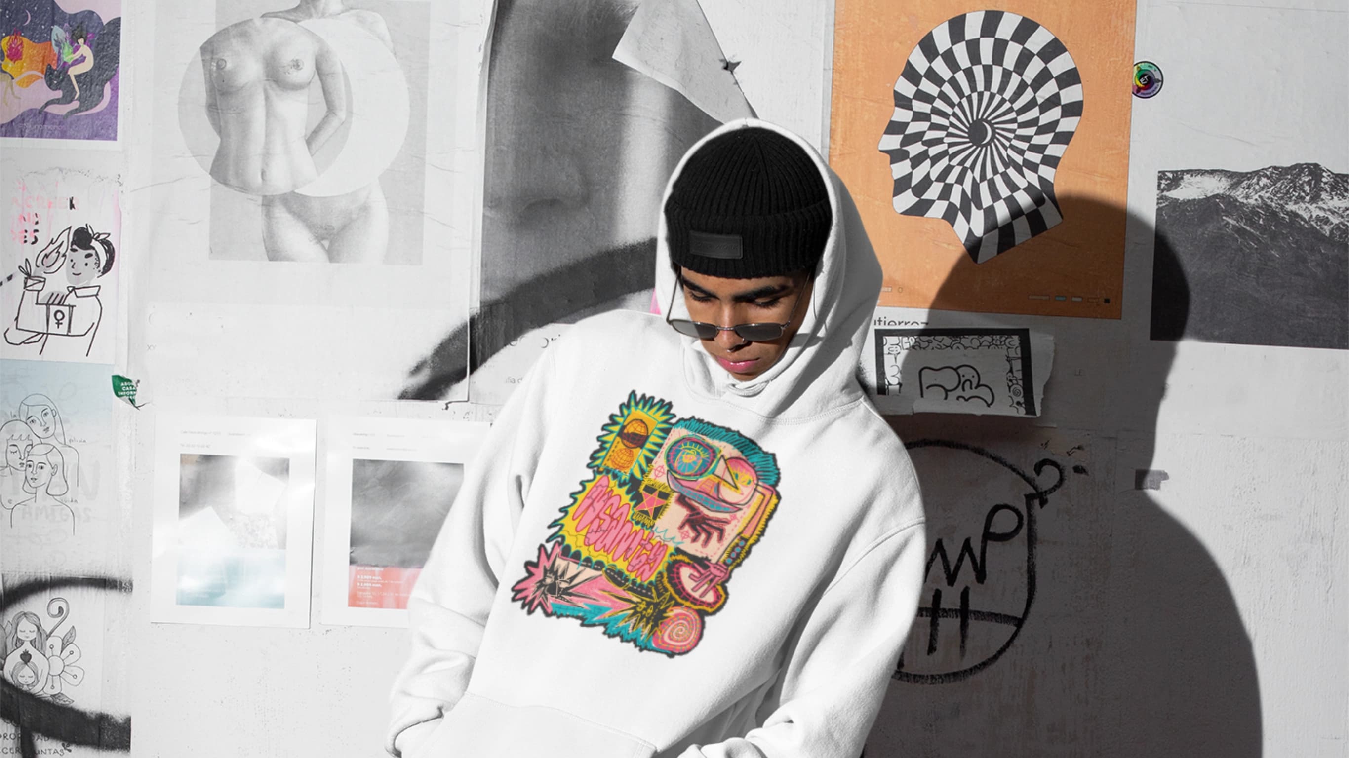 A man wearing a sweater by nsanity with a grungy streetwear design